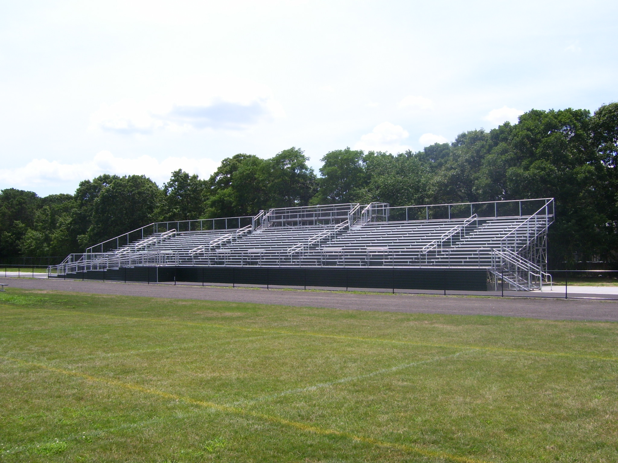 Bleachers in front of a field